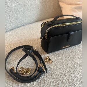 Michael Kors, camera bag, excellent condition, cross body strap included.